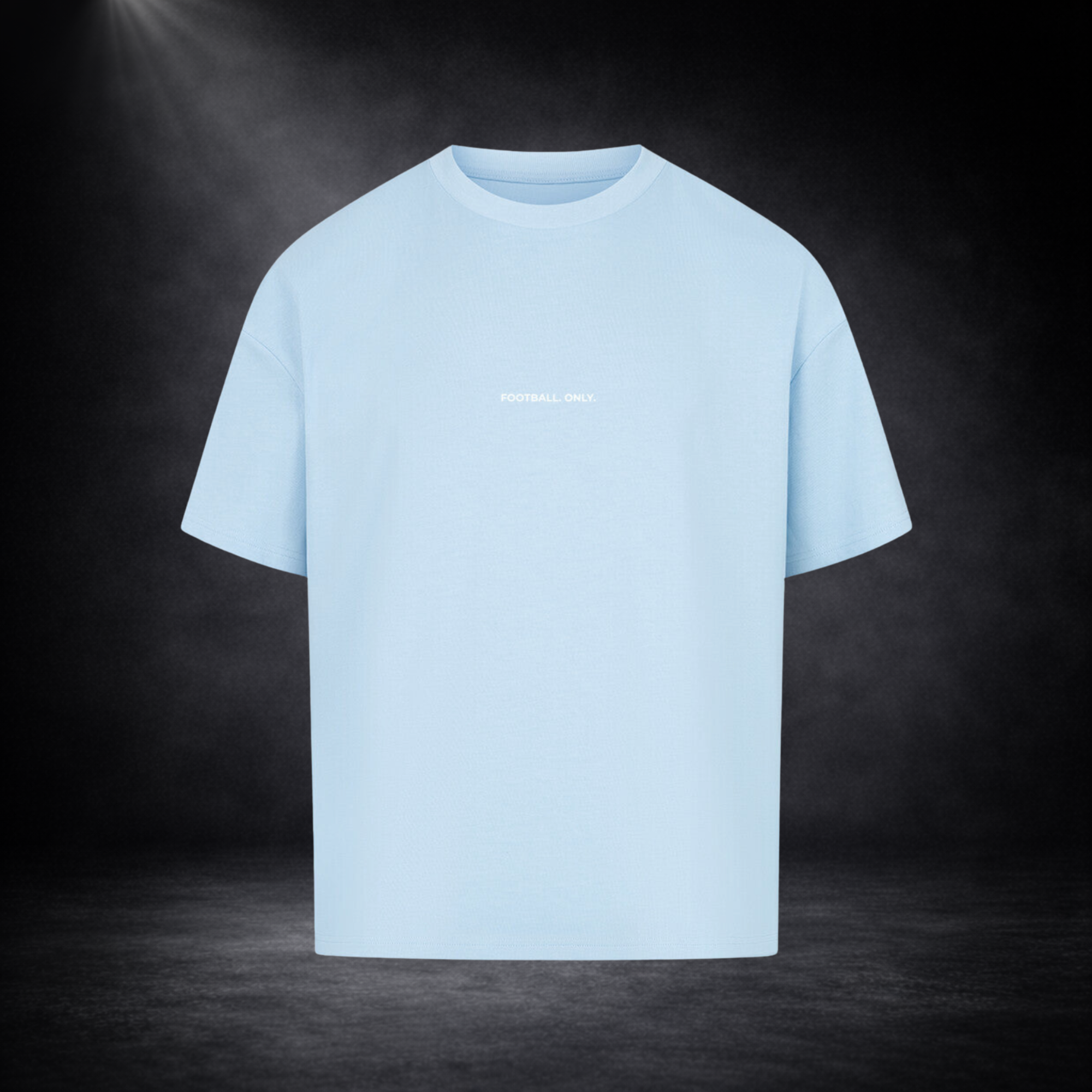 Hellblaues Oversized T-Shirt Vorderseite mit kleinem „Football Only“ Schriftzug, freigestelltes Produktbild auf dunklem Studio-Hintergrund, minimalistisches Premium Streetwear Design